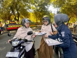 Bidhumas Polda Aceh Bagikan Koran Gratis kepada Masyarakat pada Momen Hari Bhayangkara ke-79