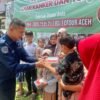 Bidhumas Polda Aceh Bagikan Ratusan Kilogram Kurma Bantuan Kapolda kepada Masyarakat