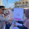 Polres Aceh Utara Bersama Bhayangkari Berbagi Takjil di Huntara Meunasah Alue Ie Puteh