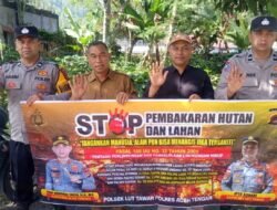 Personel Polres Aceh Tengah Pasang Spanduk Imbauan dan Sosialisasi Cegah Karhutla